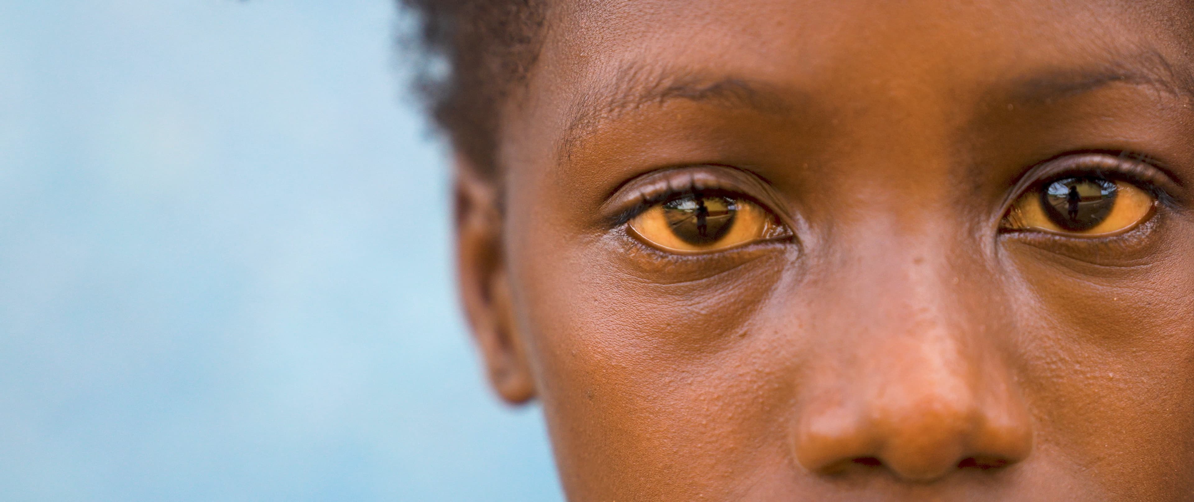 Close portrait of a child's eyes, Sierra Leone