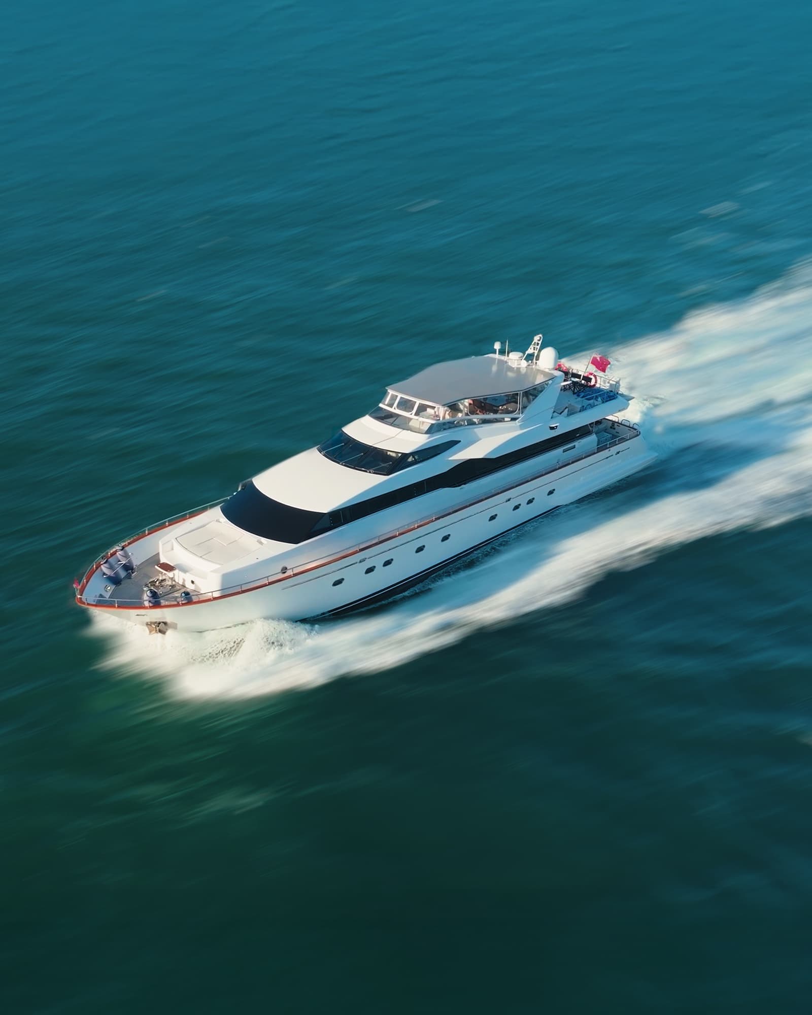 Aerial view of the superyacht Liberté cutting through the water